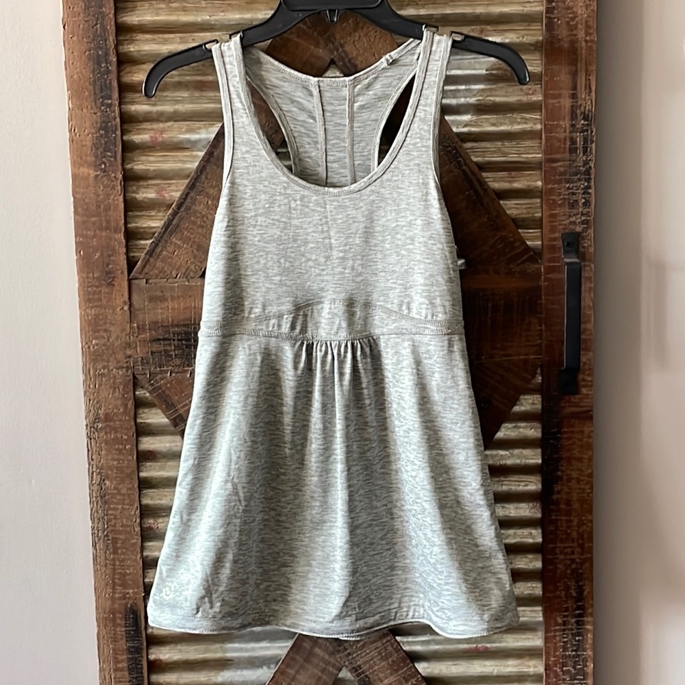 Gray Workout shirt size small. Drawstring waist. Can wear straight or cinched.